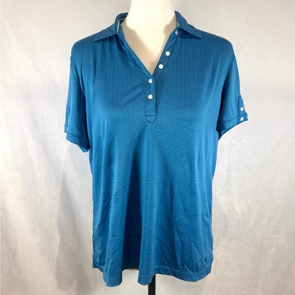 Lady Hagan blue textured and branded hydro dri gold polo size large